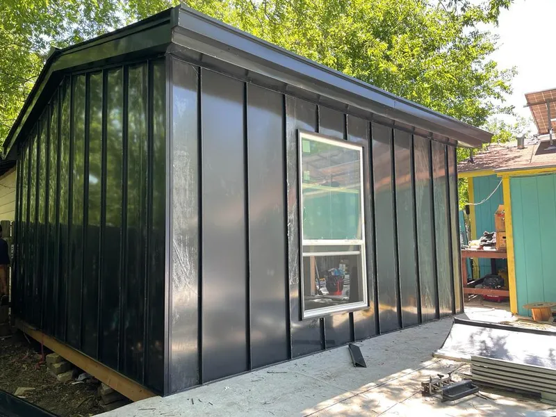 Black standing seam metal wall panels for Metal Roof Installation in Keokuk