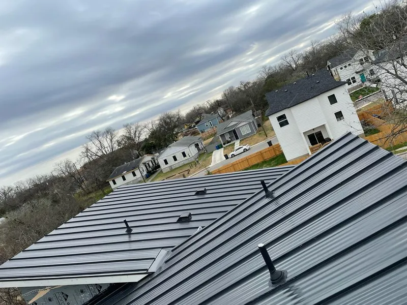 Standing seam metal roof panels with vents for Skylight Repair in Keokuk